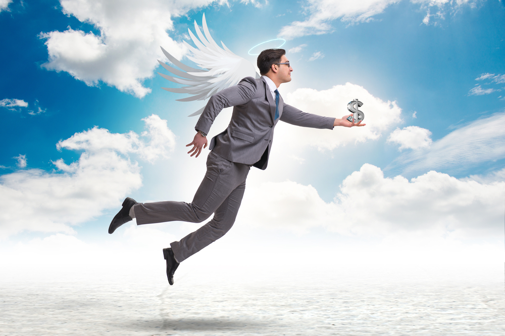 Angel,Investor,Concept,With,Businessman,With,Wings