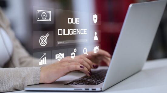 A,Business,Person,Using,Laptop,With,Visual,Due,Diligence,Concept.
