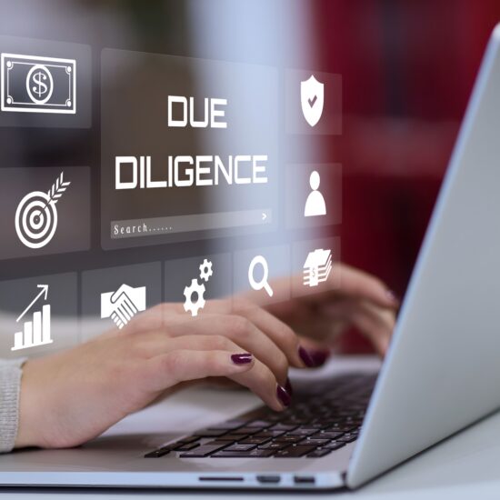 A,Business,Person,Using,Laptop,With,Visual,Due,Diligence,Concept.